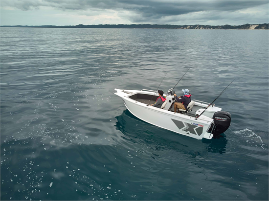 Quintrex fishing boat aluminium gliding through choppy waters